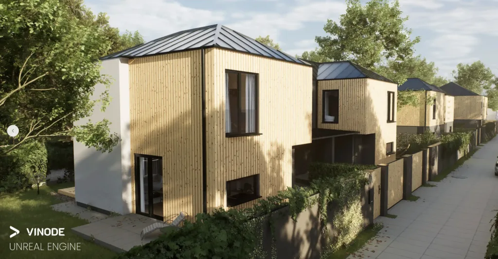 3D render of modular houses with light siding along a tree-lined path