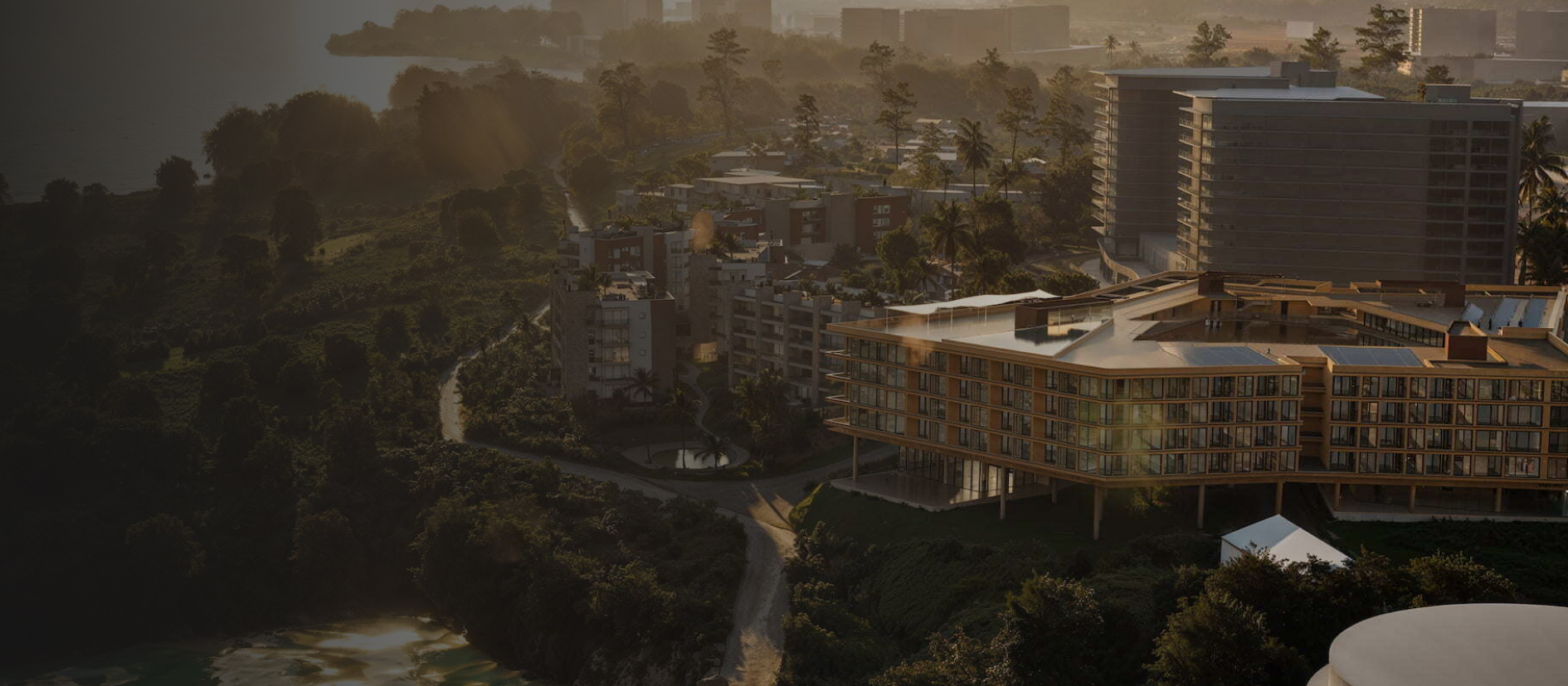 Aerial 3D render of a development shown within its surrounding streetscape and landscape.